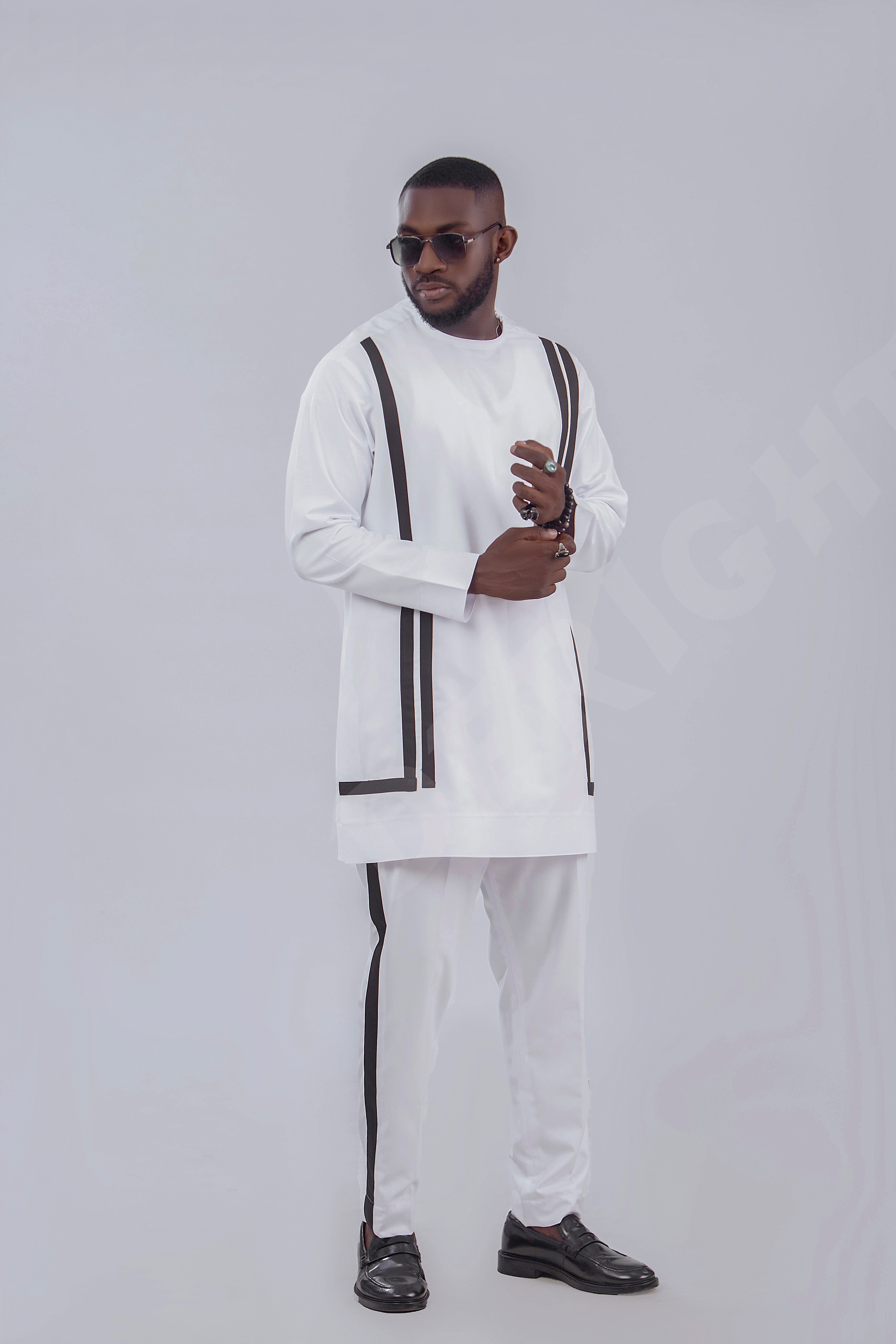 Classic White Men's Attire with Sleek Black Detailing