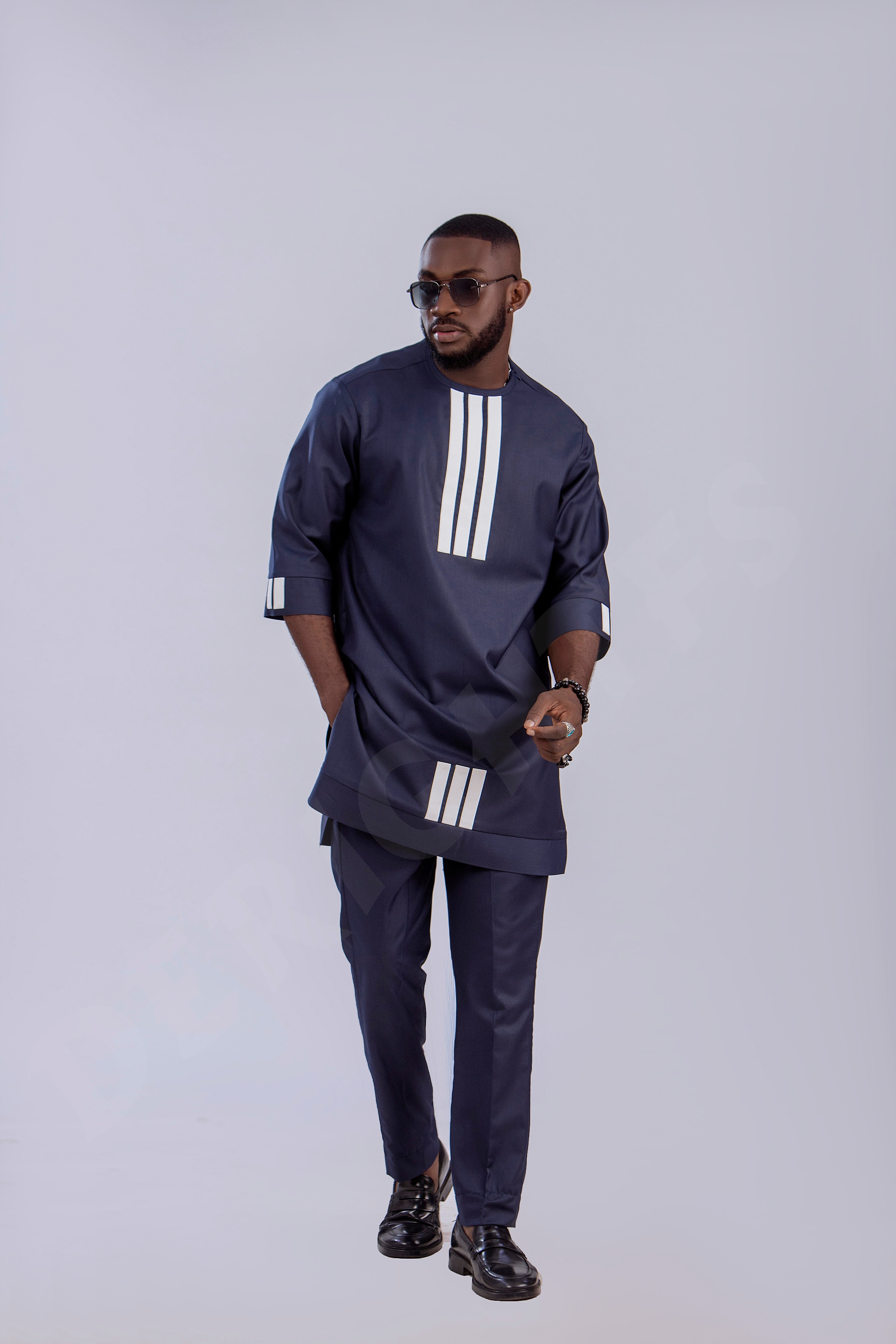 Navy Blue Men's Traditional Outfit with Modern White Accents
