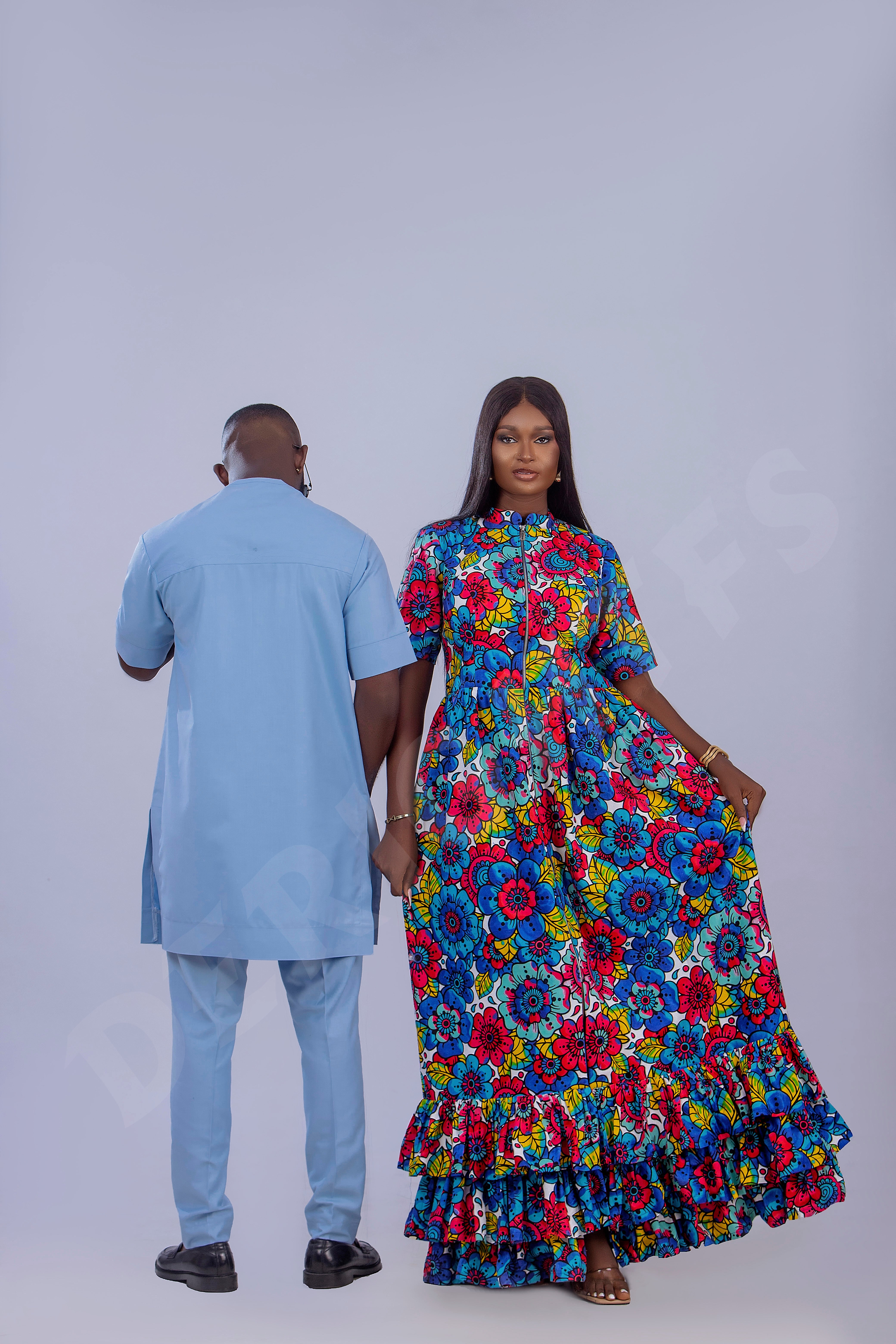 Stylish Light Blue Men's Outfit with Unique Navy Blue Accents