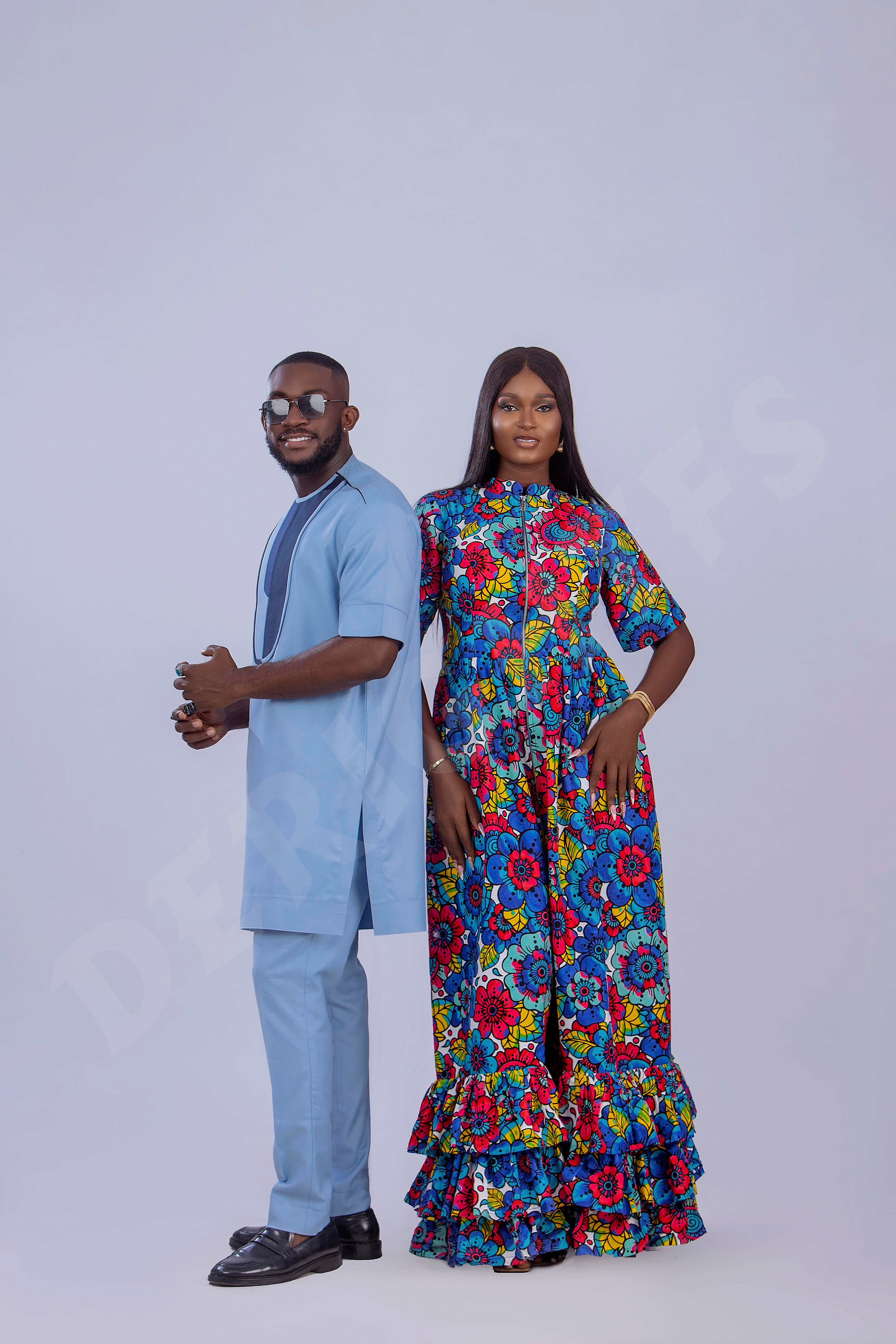 Stylish Light Blue Men's Outfit with Unique Navy Blue Accents