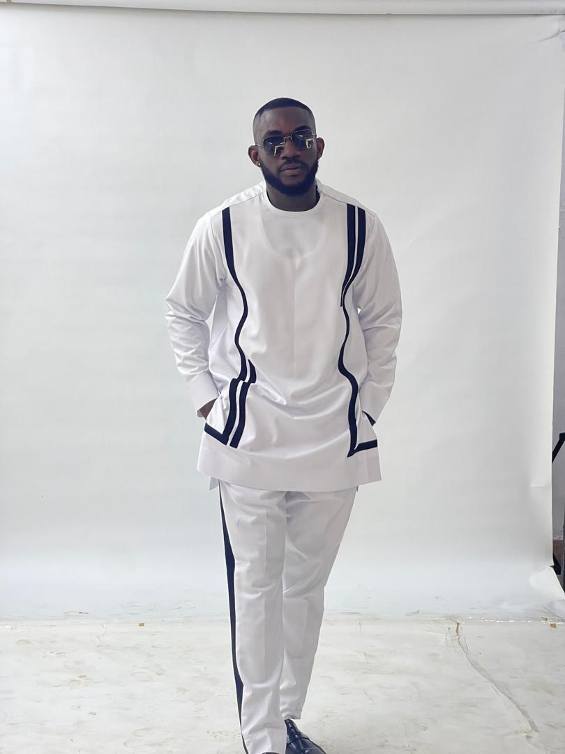 Classic White Men's Attire with Sleek Black Detailing