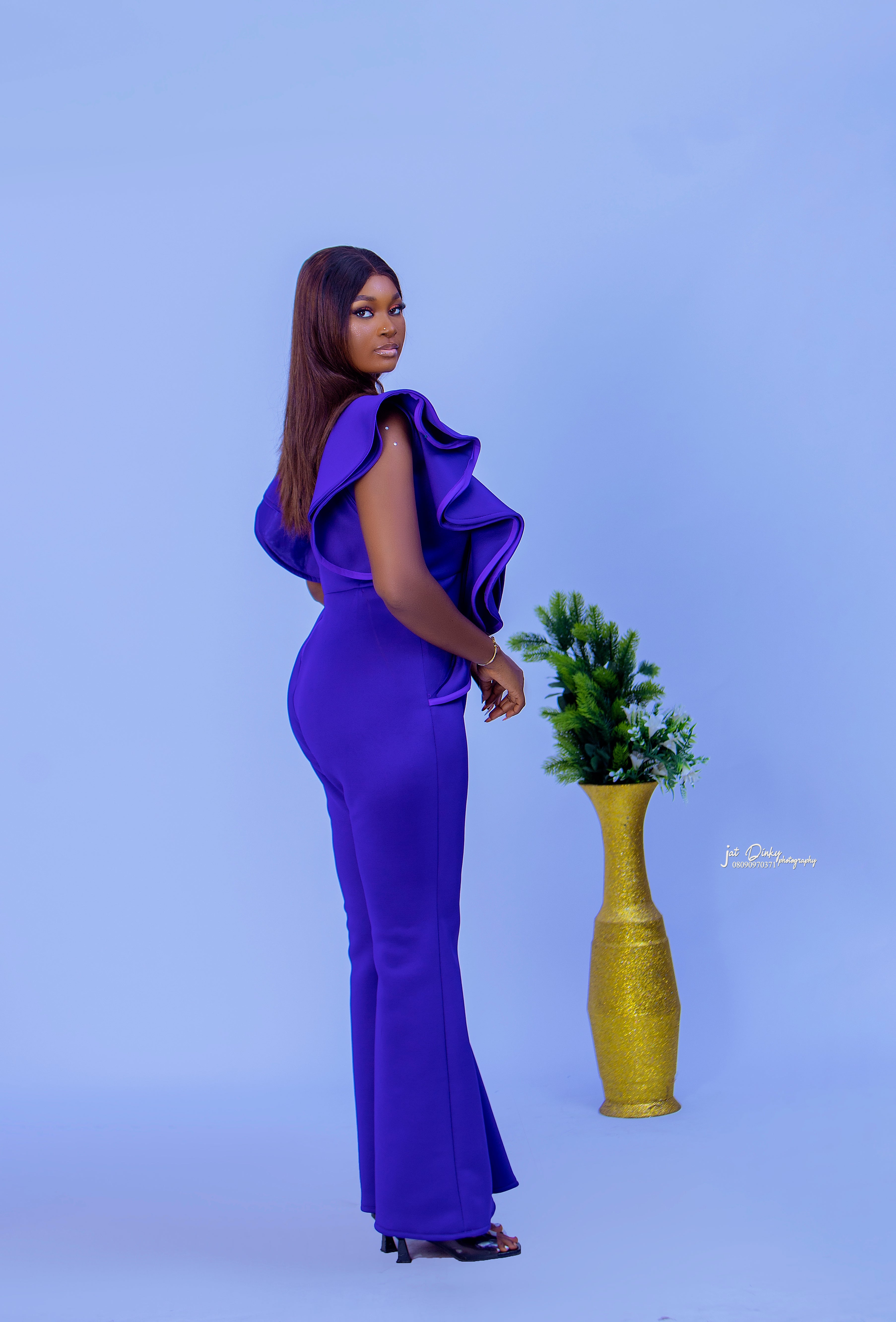 Royal Amethyst Jumpsuit is tailored to perfection and ready to wear.